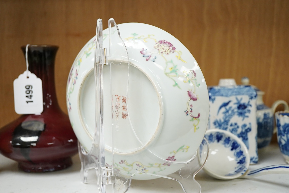 A Chinese famille rose and green ground dish decorated with birds amongst flowers, 17cm in diameter